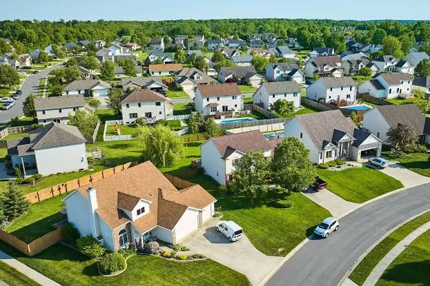 Aerial view of suburban homes and green lawns in Creve Coeur
